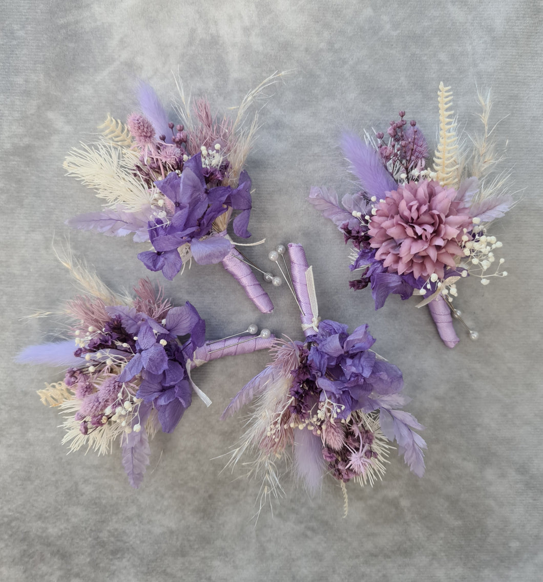 Groom & groomsmen buttonholes purple & lilac