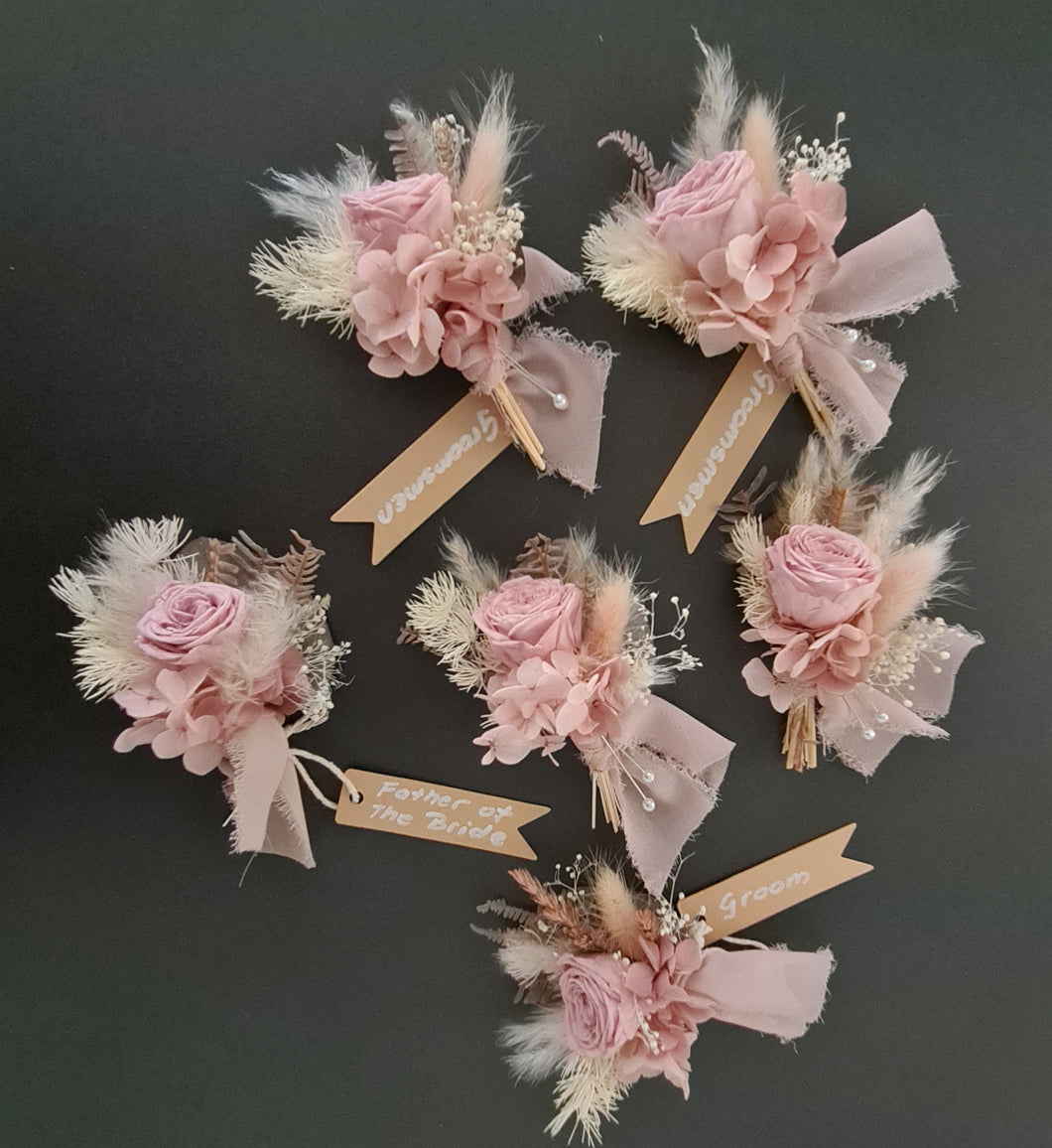 Mini preserved peony wedding buttonholes